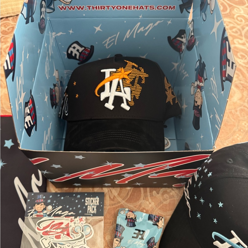 Black and Gold/Orange Mago Hat by thirty-one